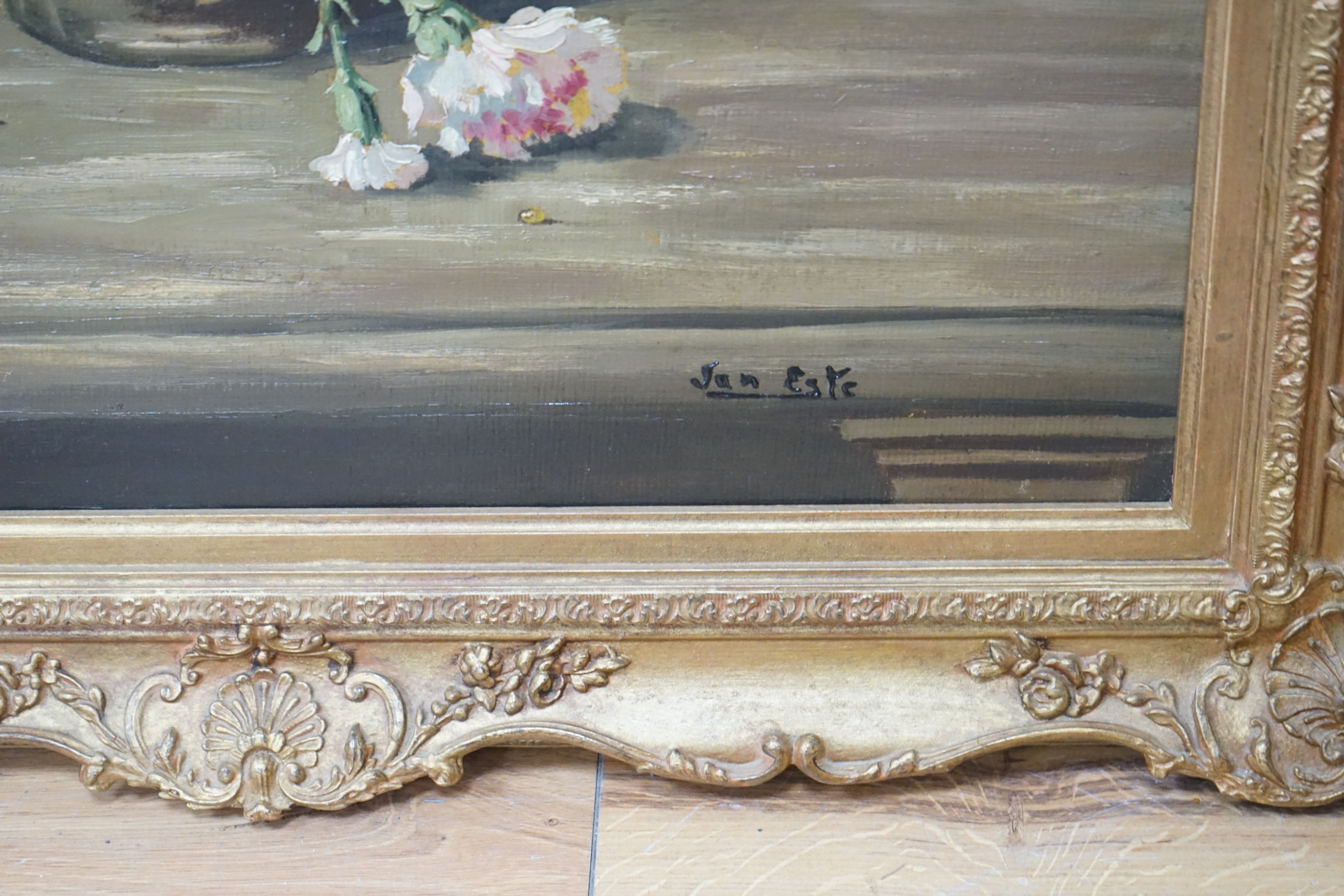 Van Este, oil on canvas, Still life of Carnations in a vase, signed, 79 x 58cm, gilt framed. Condition - good